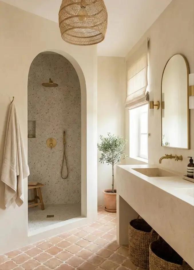 Seagrass baskets and olive jars for mediterranean bathroom decor